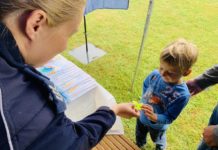 Policyjne stoisko profilaktyczne na Ogólnopolskich Dniach Flisactwa w Ulanowie